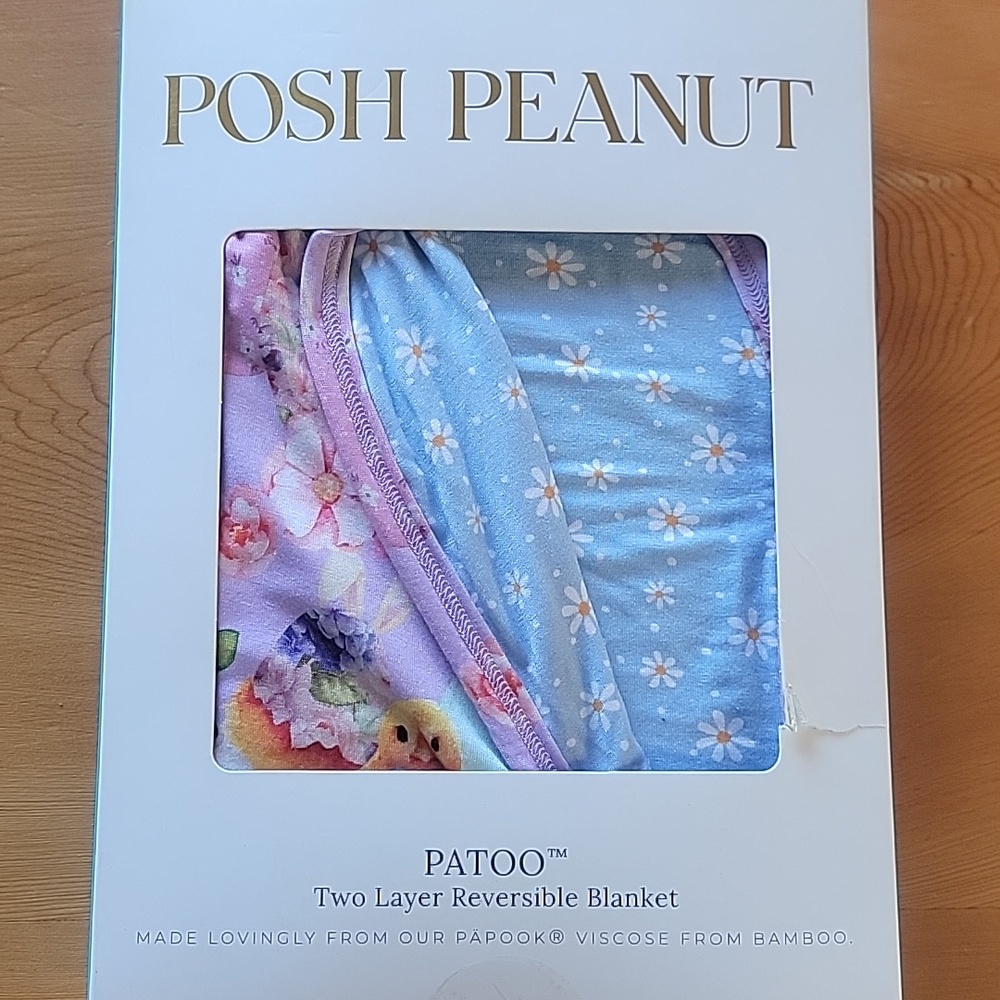 Posh Peanut Lavender Floral Reversible Baby Blanket with Yellow Chicks And Eggs.